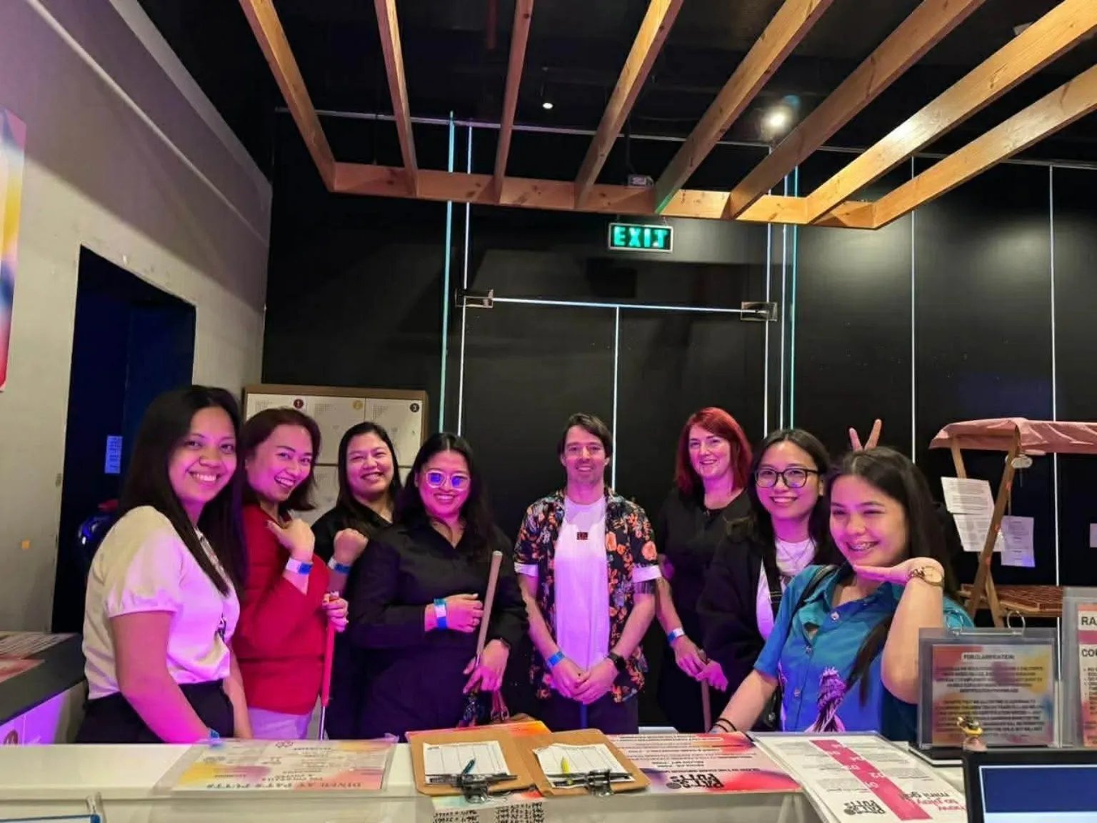 Members of the Amplio team together at a team event