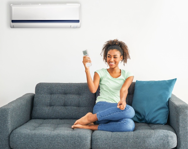 Lady on couch with AC