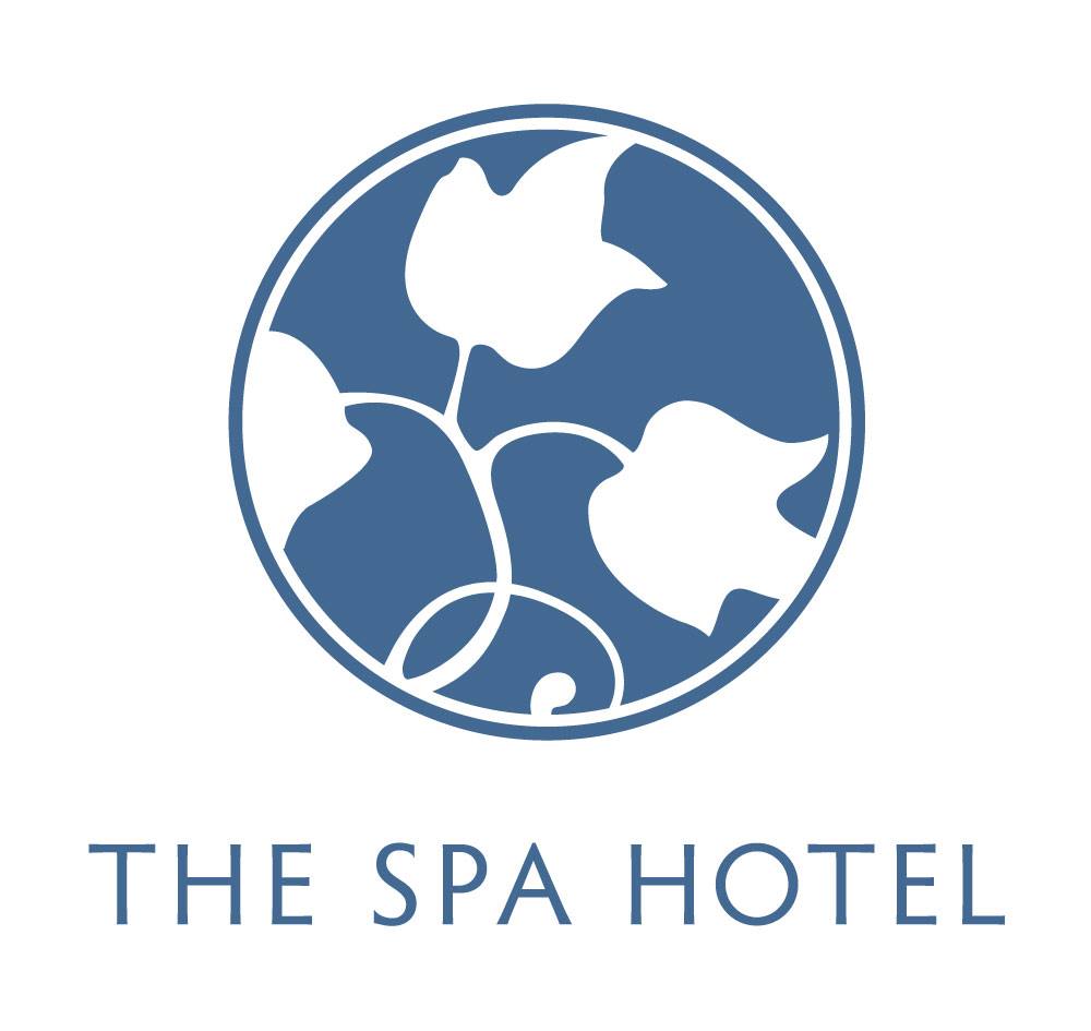 Logo of The Spa Hotel featuring a circular design with three stylized leaves inside.