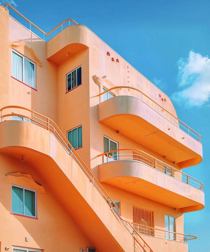 1996: pastel apartment building with curved balconies