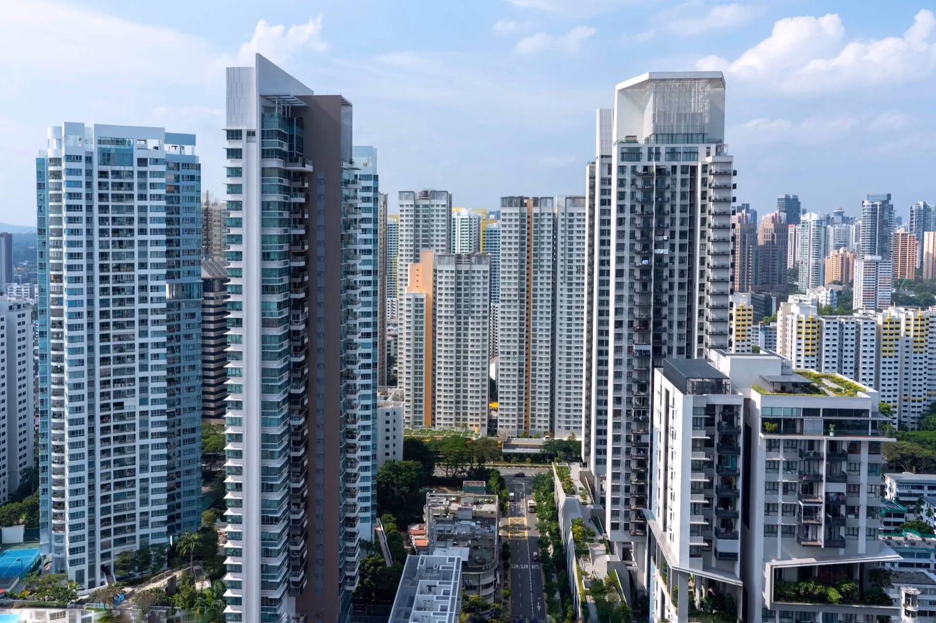 Dense cluster of residential high-rises seen from above