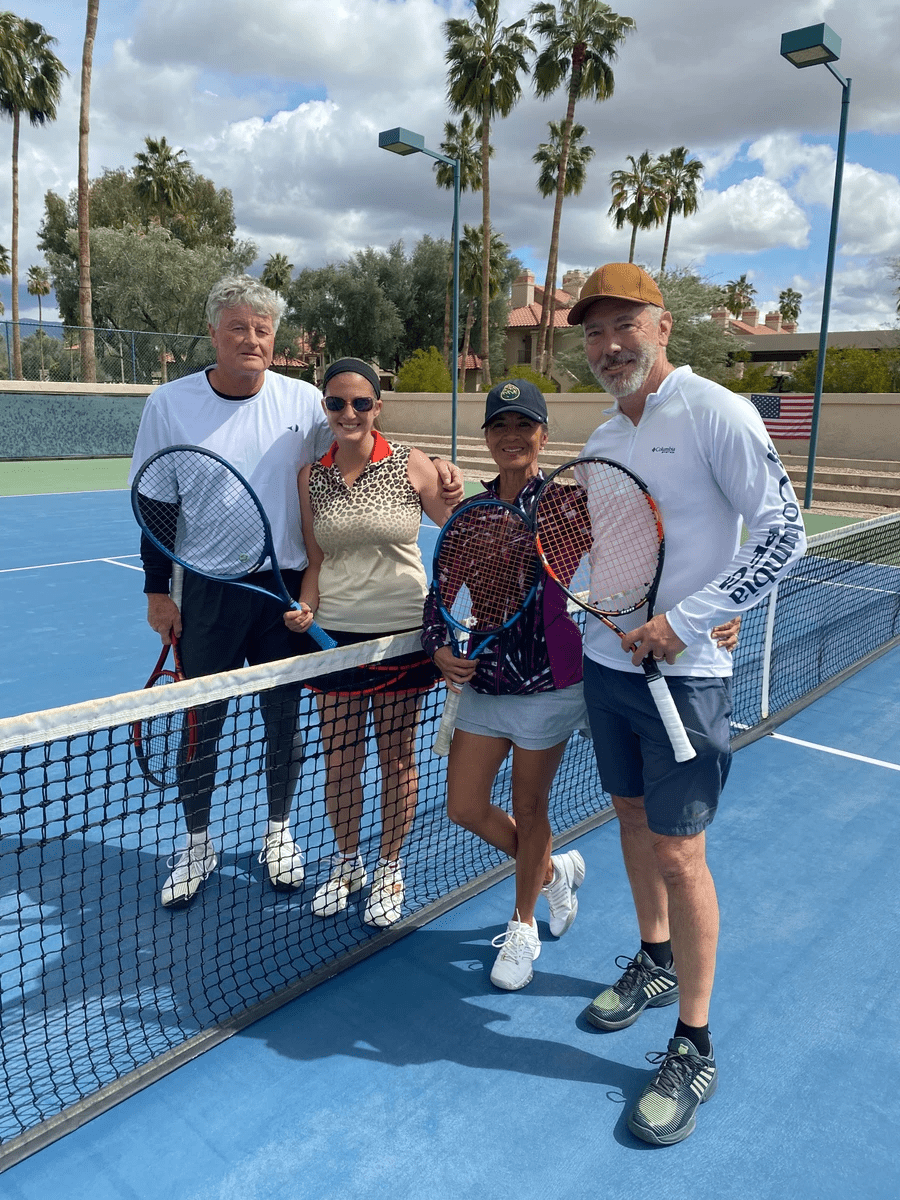 Four players gathered at the net for the 2024 mixed doubles final.