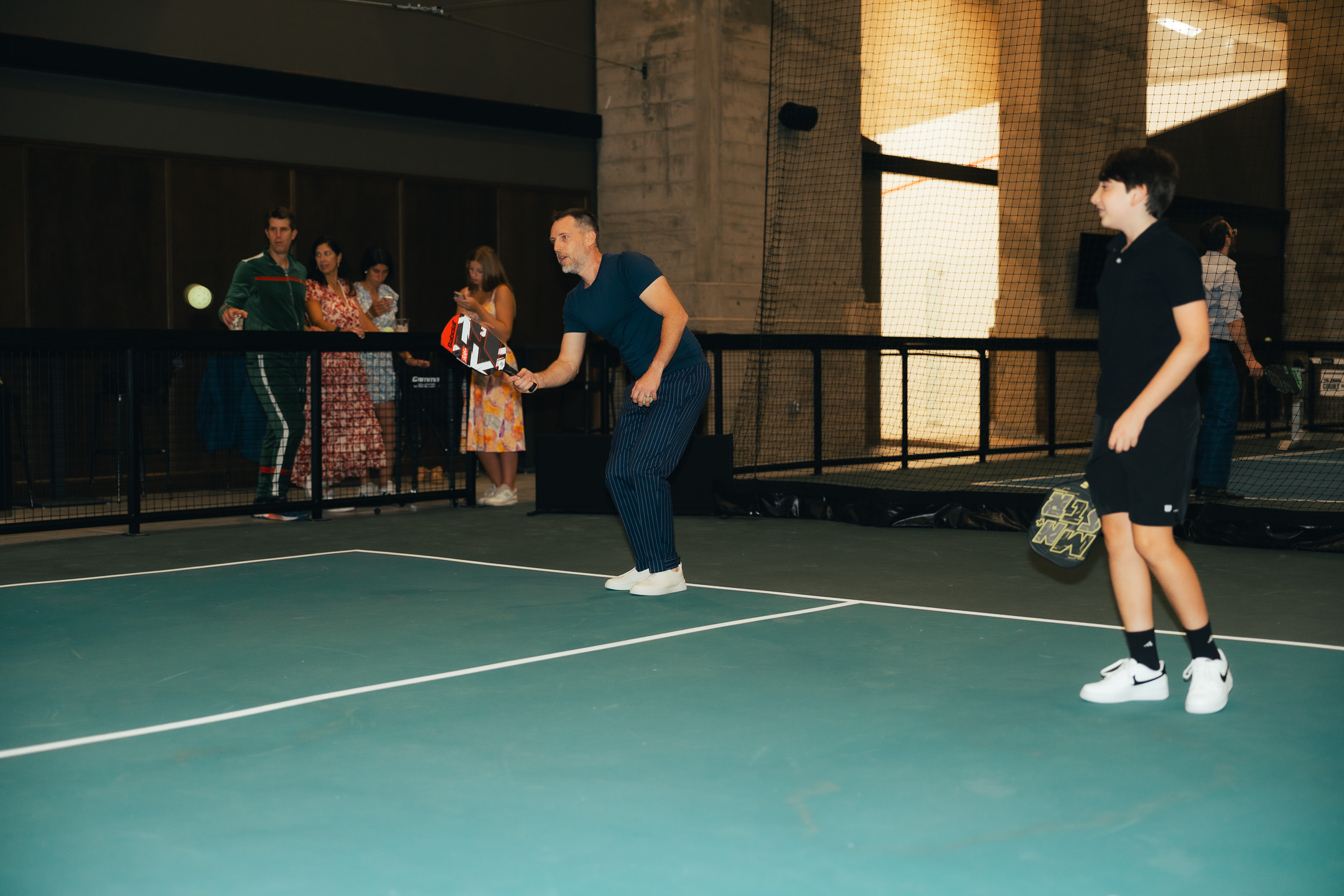 Guests playing pickleball at Ballers