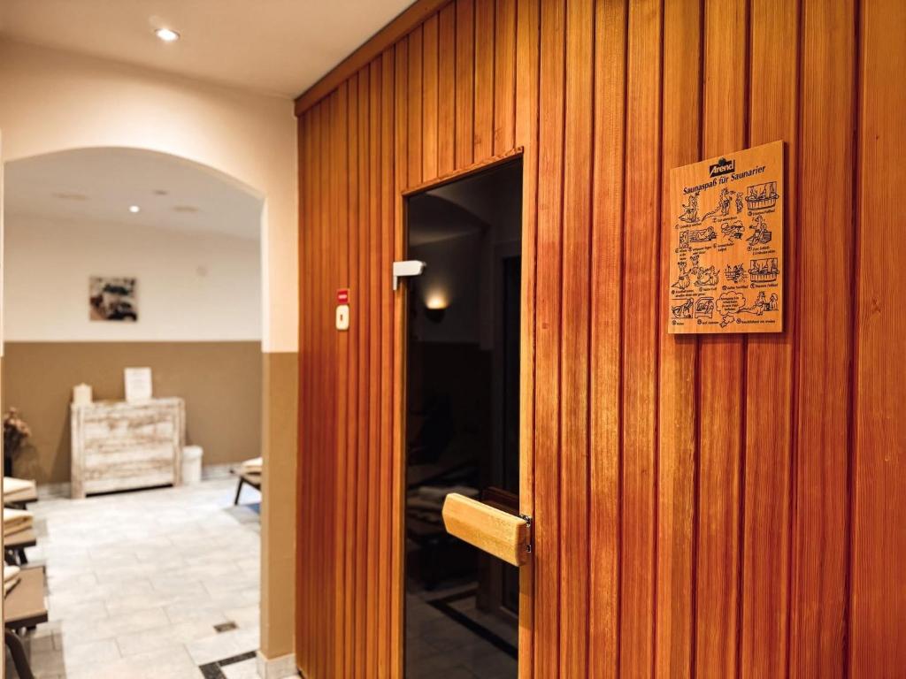 Zugang zu Sauna und Dampfbad