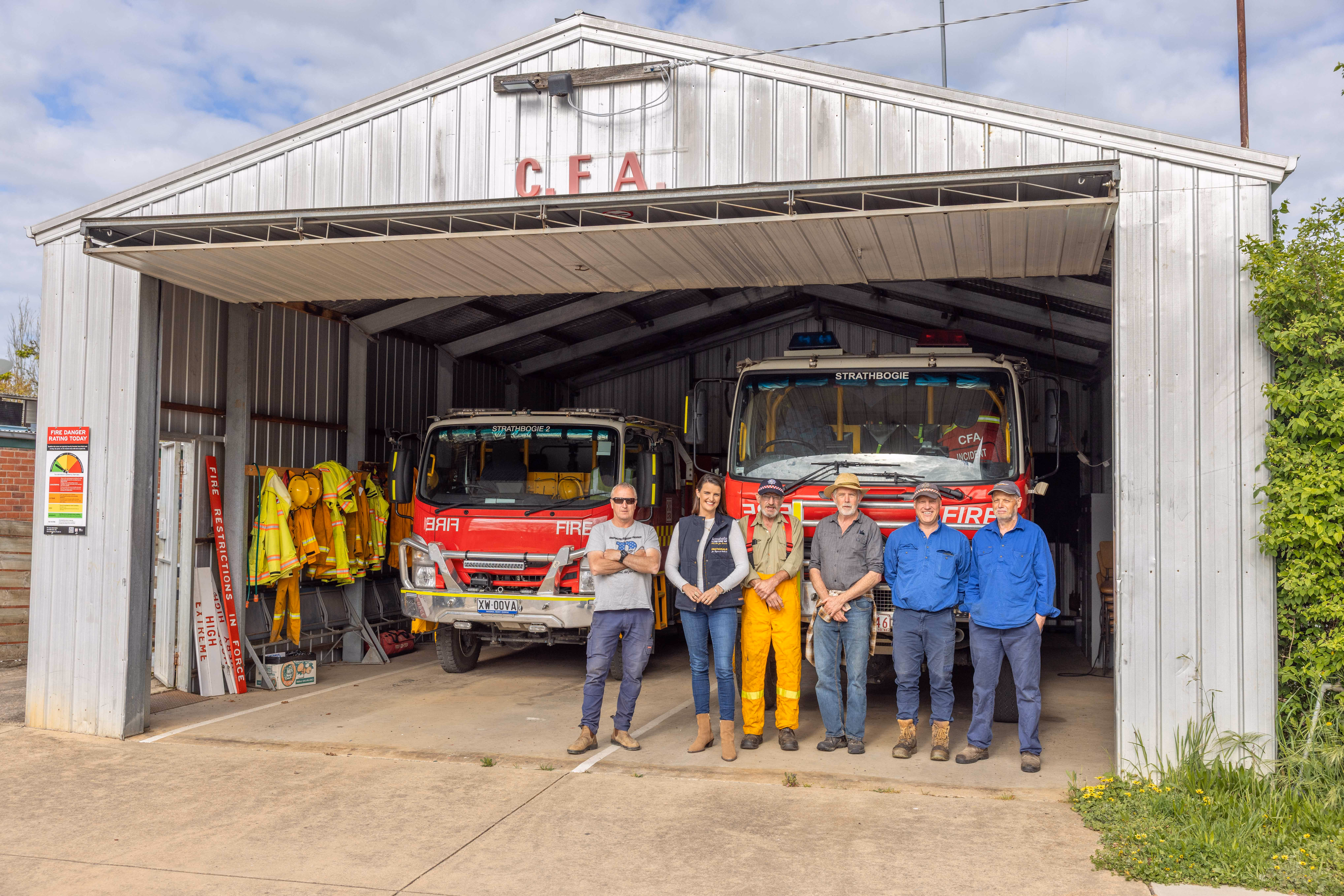 Annabelle Cleeland with CFA volunteers at the station