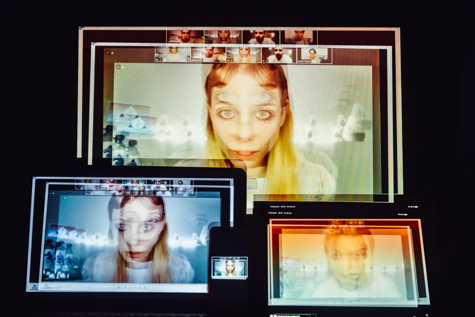 #Protest – a face projected across several screens in the dark