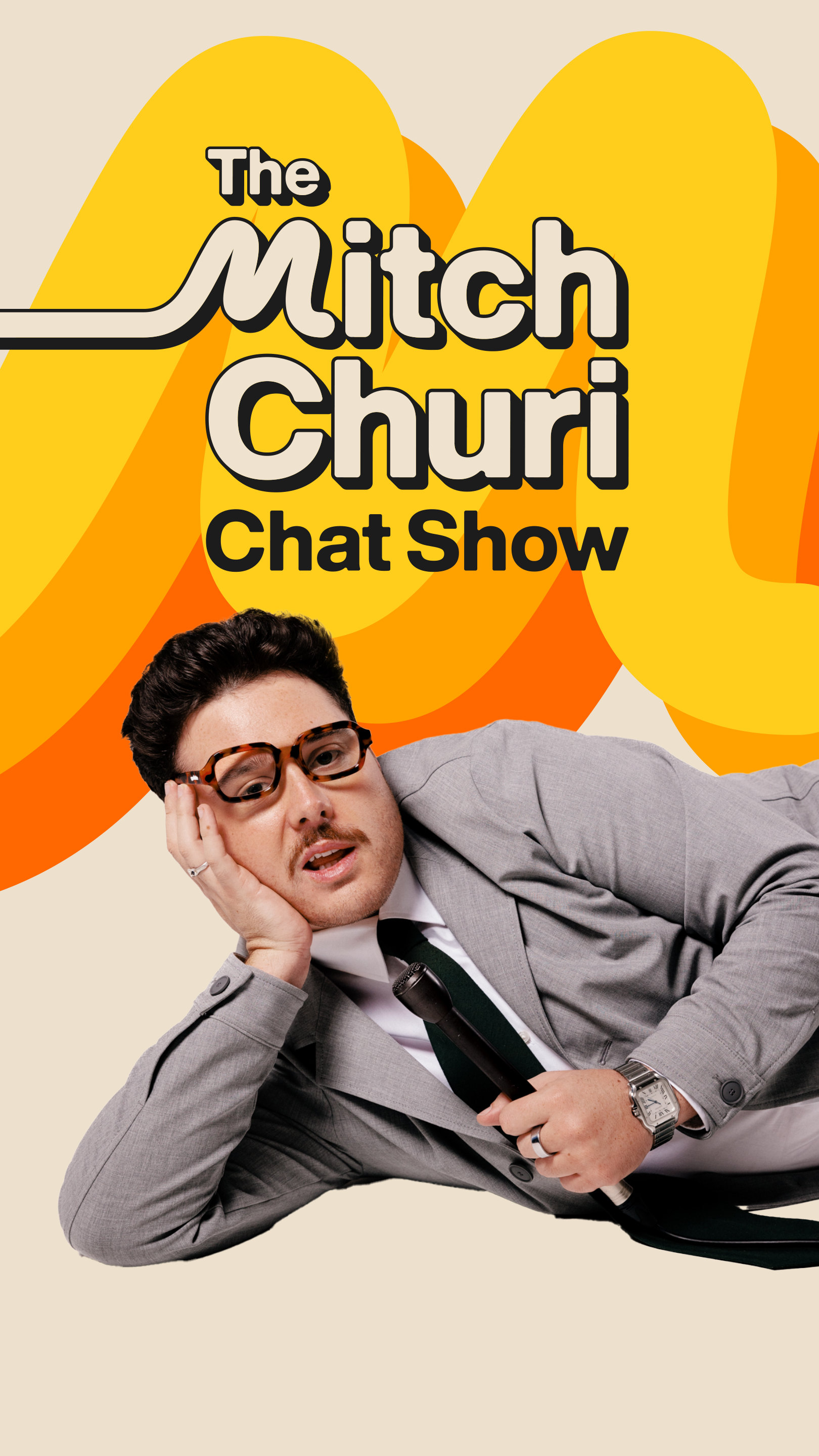 The Mitch Churi Chat Show key art: Mitch lying on his side with a microphone, beneath the logo