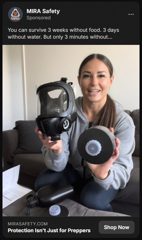 A woman with long brown hair in a ponytail sits on a couch holding a black gas mask and its round filter, with other mask parts on a table in front of her, promoting MIRA Safety's protective gear.