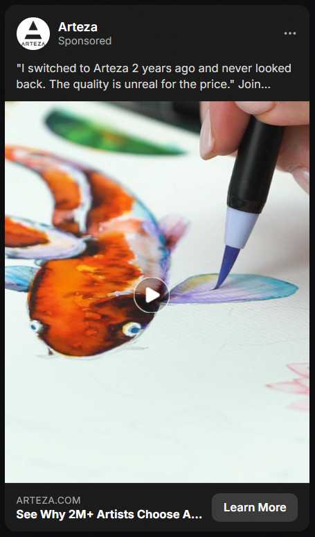 A close-up of a hand using a brush pen to paint a colorful koi fish on paper in an Arteza advertisement.