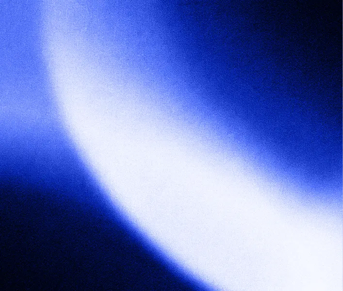 Abstract blue light beam with a glowing, curved shape fading into dark background.