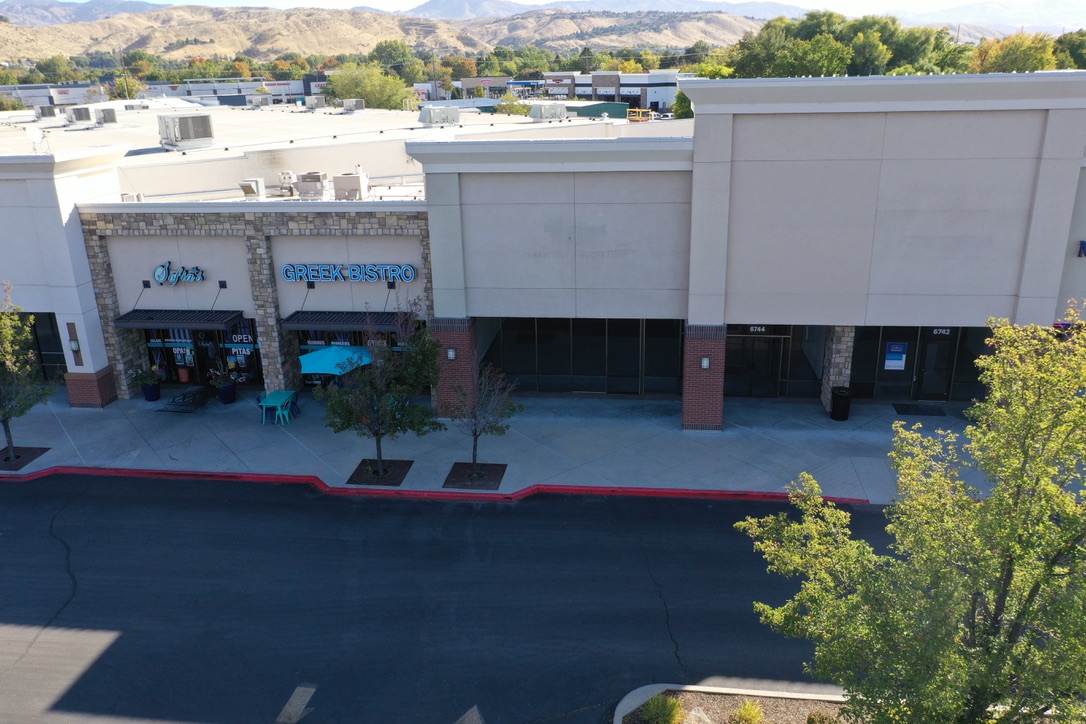Storefronts at the N Glenwood St retail center in Boise, including Greek Bistro