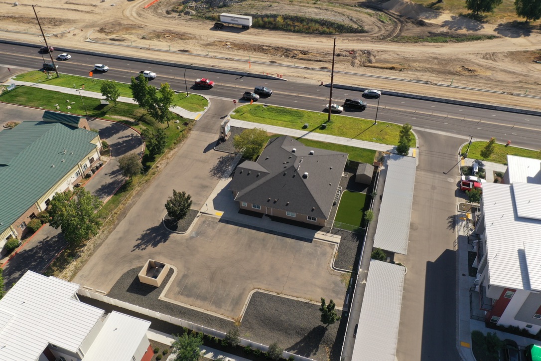 Aerial of State Street Veterinary Hospital with State Street traffic beyond