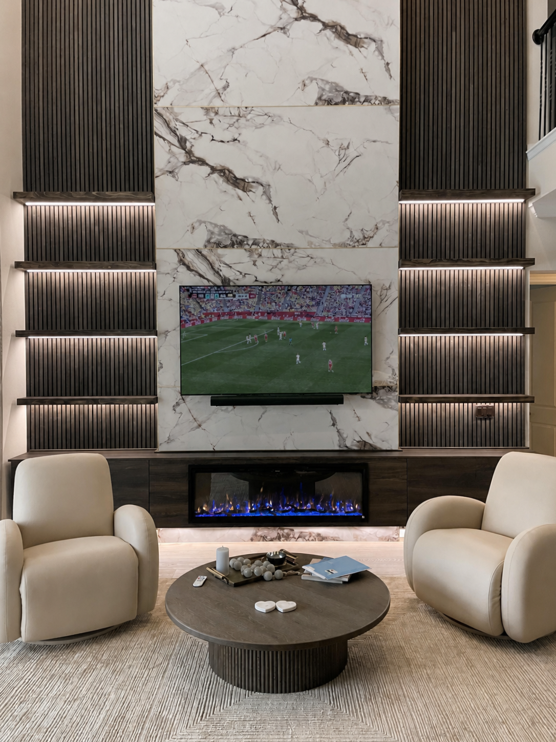 Feature wall with marble center panel, slat side panels and integrated lighting