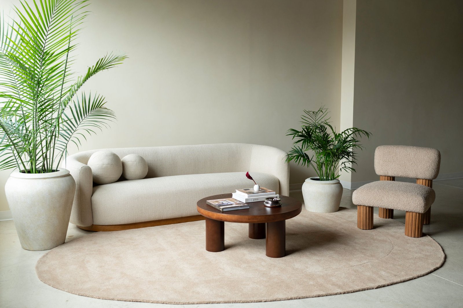North Edit, sofa, palms and boucle chair