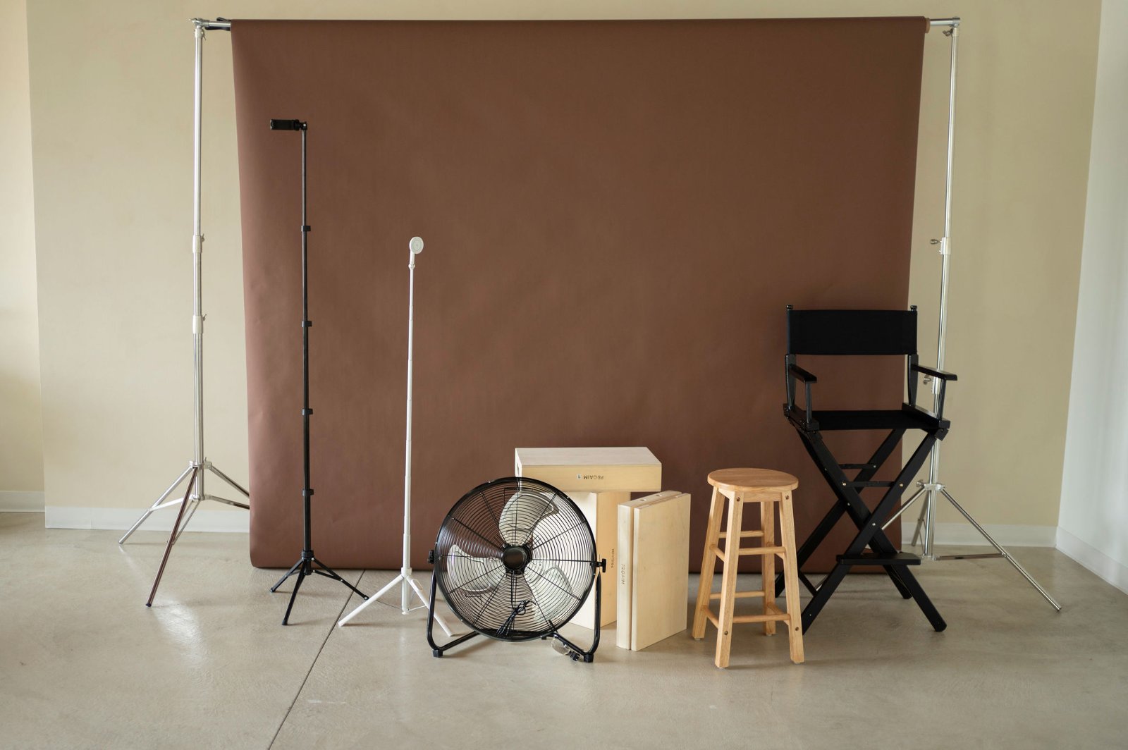 Backdrop Edit, brown seamless with fan, apple boxes, stool and director's chair