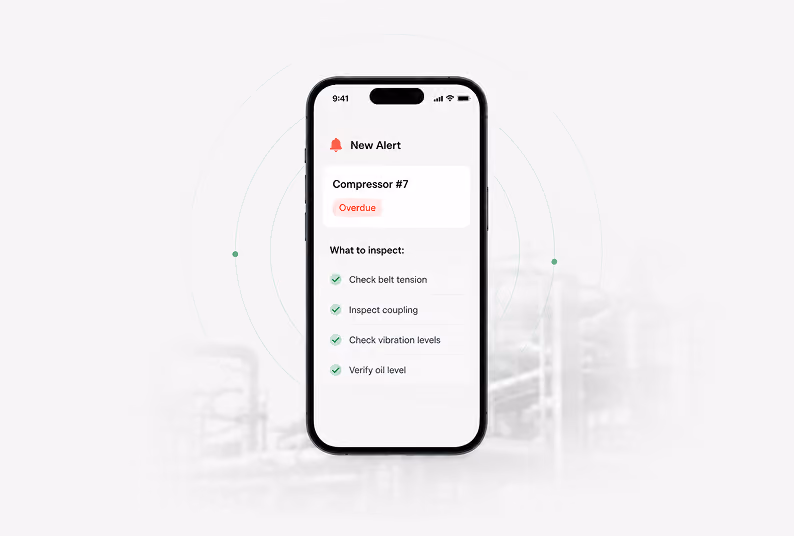 Smartphone screen displaying an alert for Compressor #7 marked as overdue, with a checklist to inspect belt tension, coupling, vibration levels, and oil level.