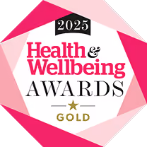 2025 Health & Wellbeing Awards Gold logo with pink geometric border.