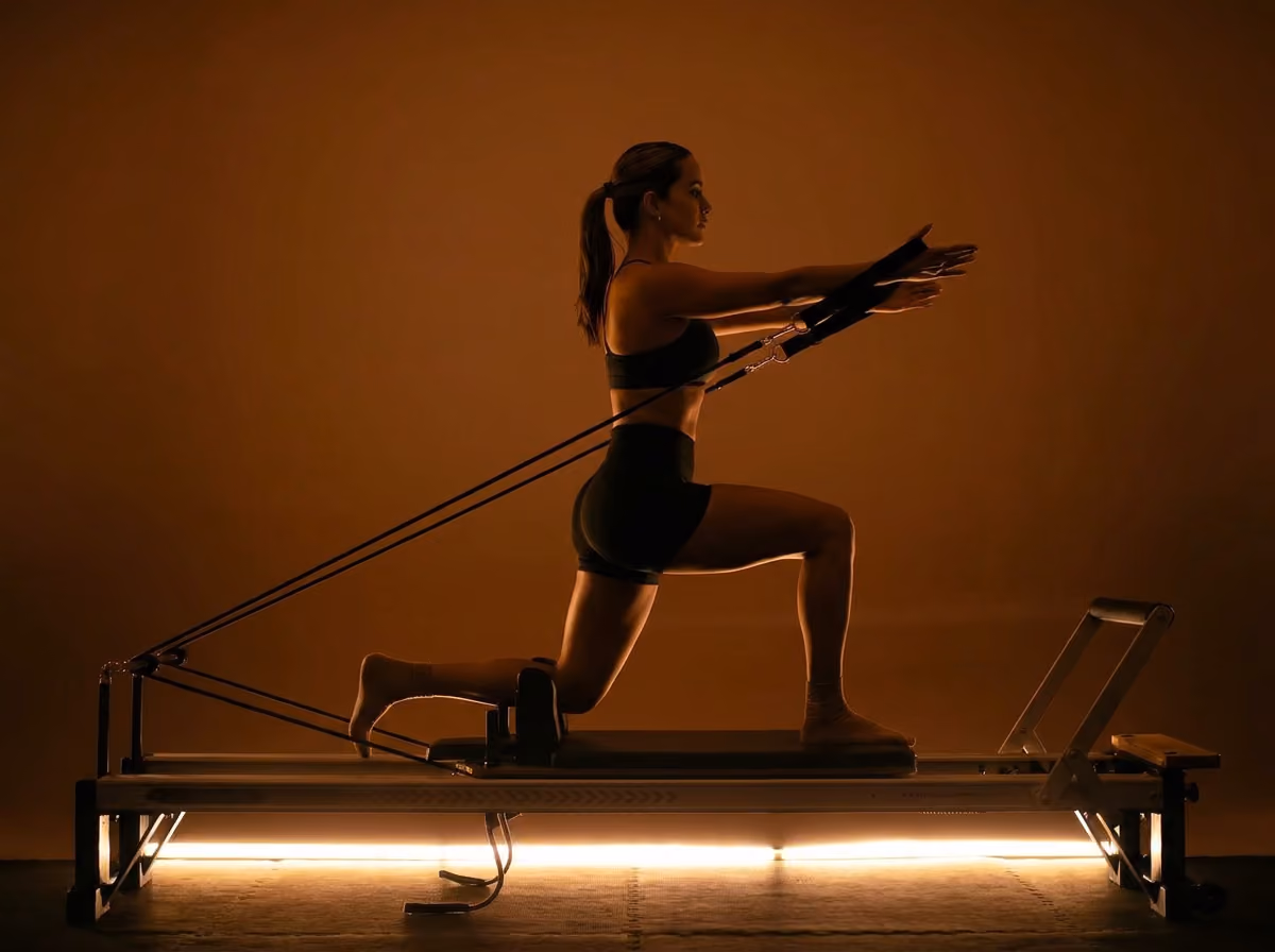 A person doing reformer pilates