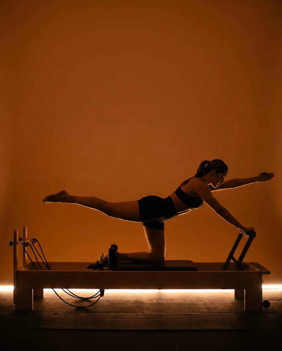 A person doing reformer pilates