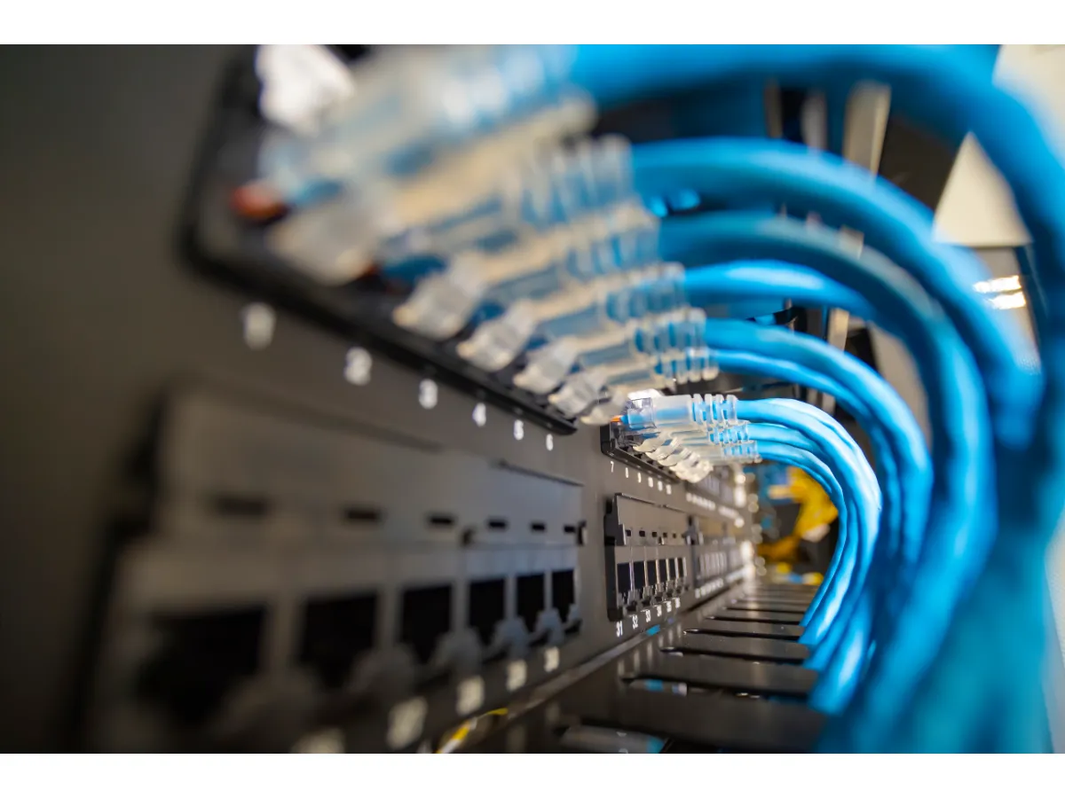 Network patch panel with blue ethernet cabling