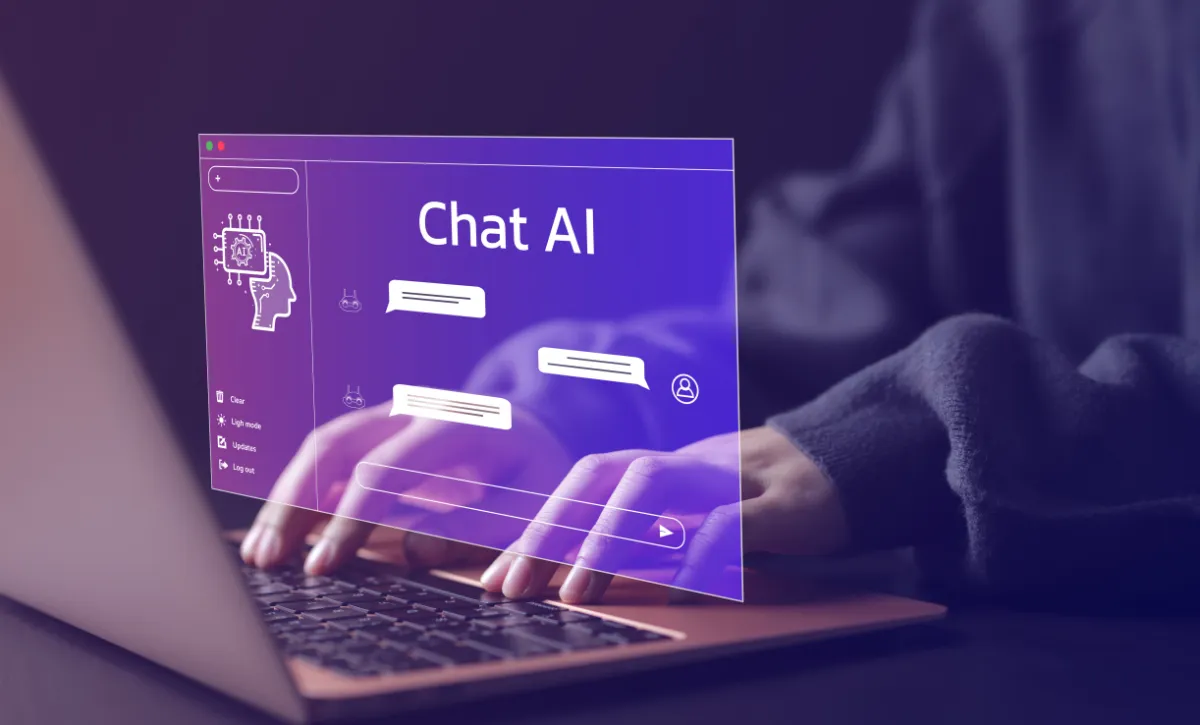 Person using an AI chat assistant on a laptop