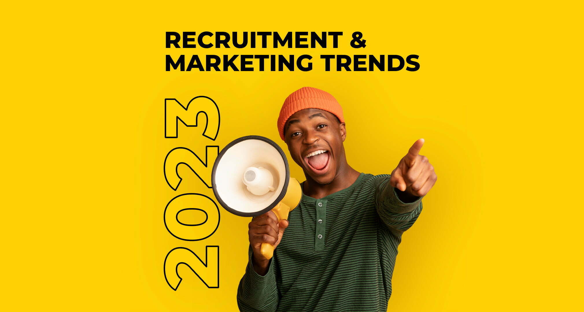 Man with a megaphone pointing at the camera, with the text 'Recruitment & Marketing Trends 2023' on yellow