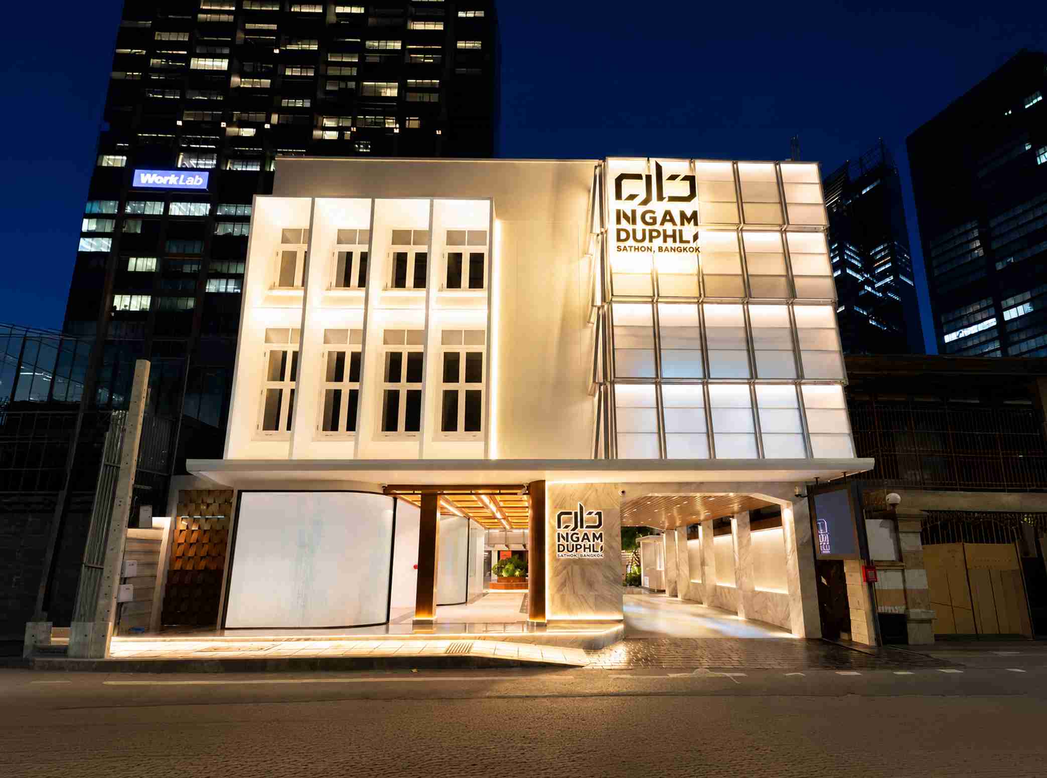 12 Ngam Duphli, front building entrance at dusk