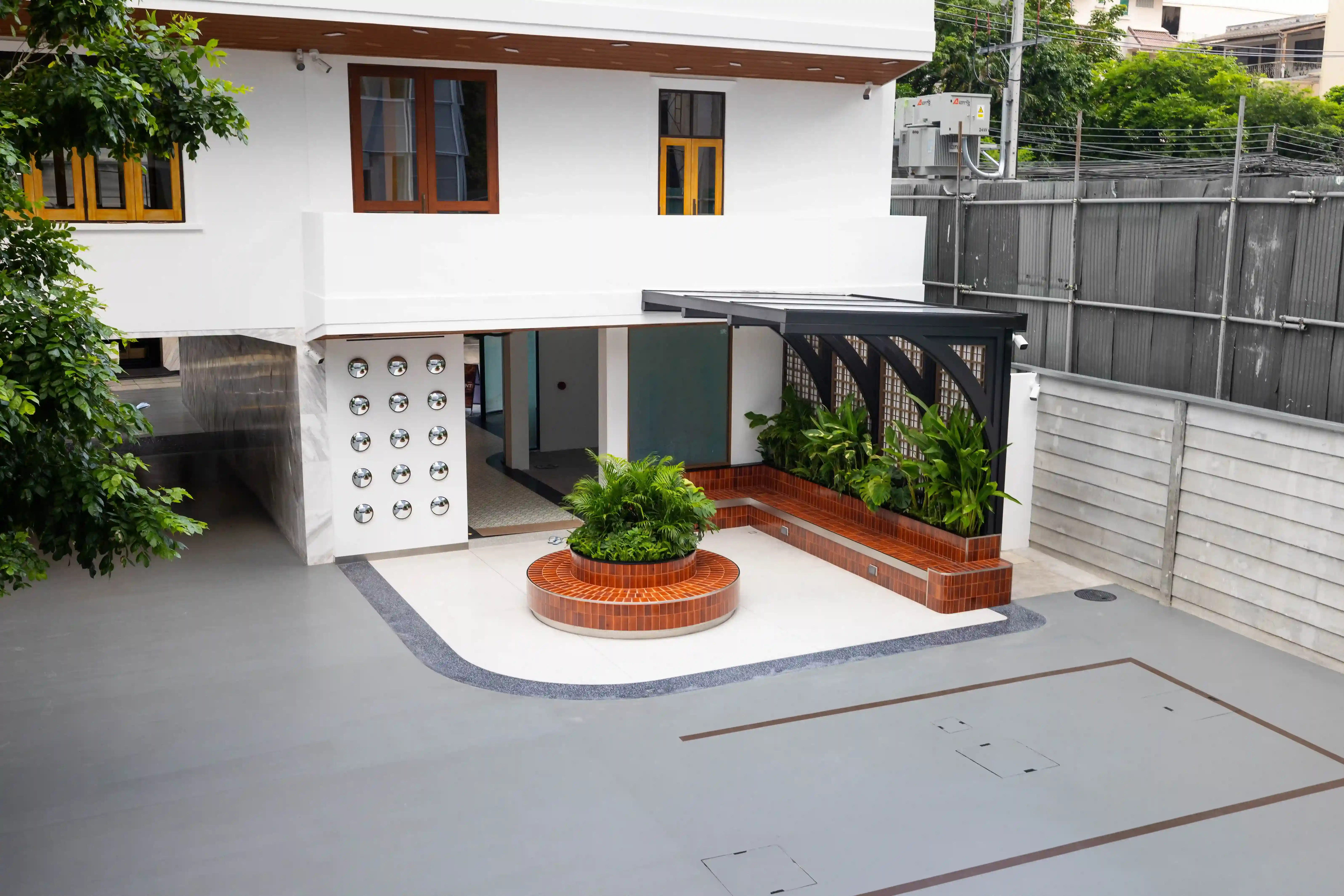 Outdoor common area with seating and planting