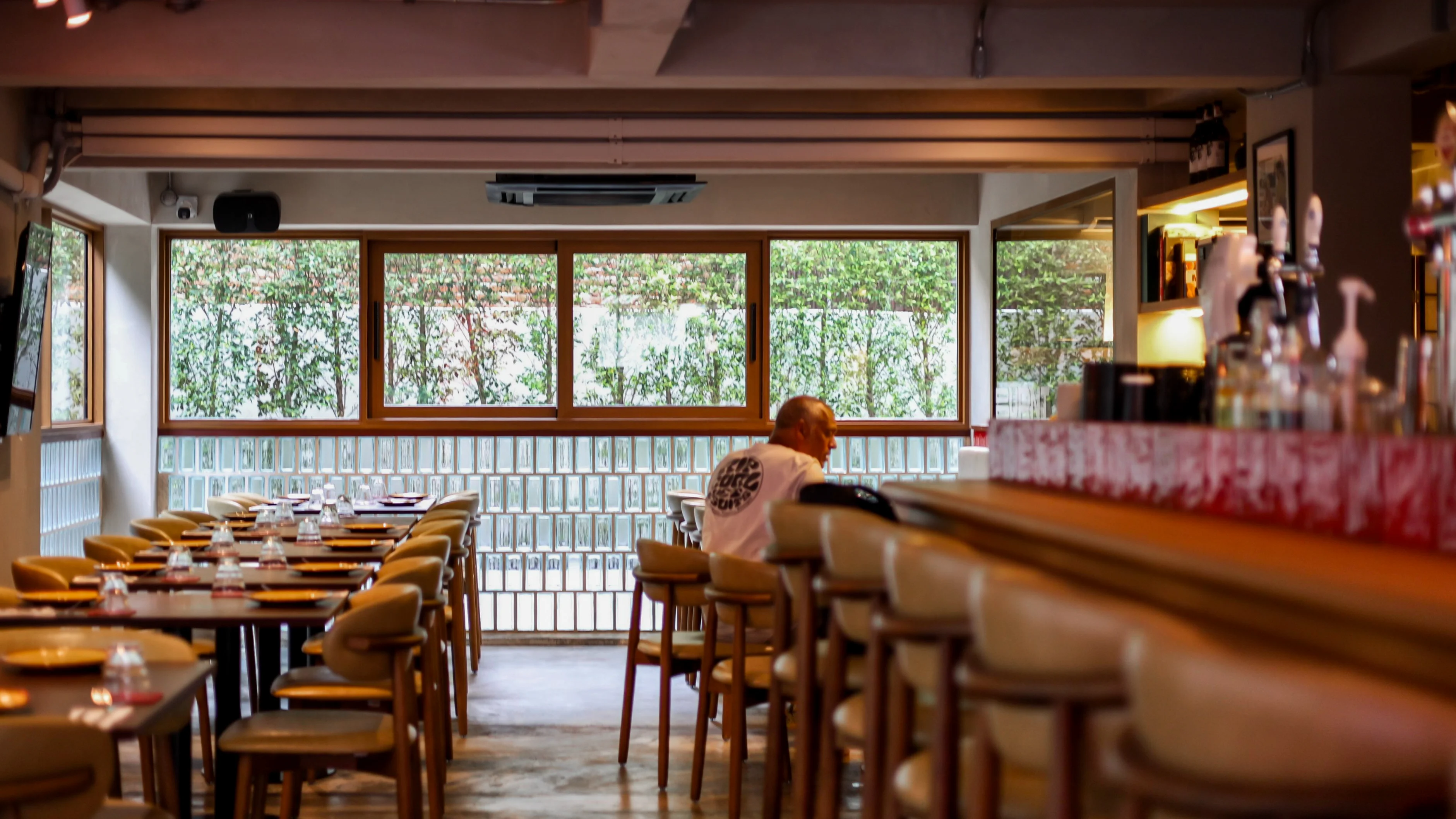 The dining room at BURNT overlooking the courtyard