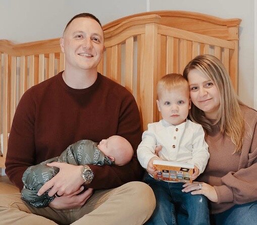 Matthew Moisan, founder of Promise Point Properties, with his family in Wilmington, Massachusetts