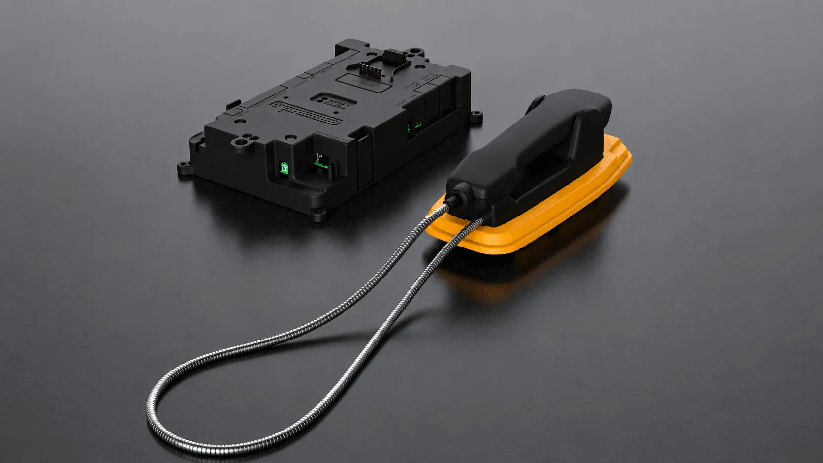 Industrial telephone handset and control unit on a dark background
