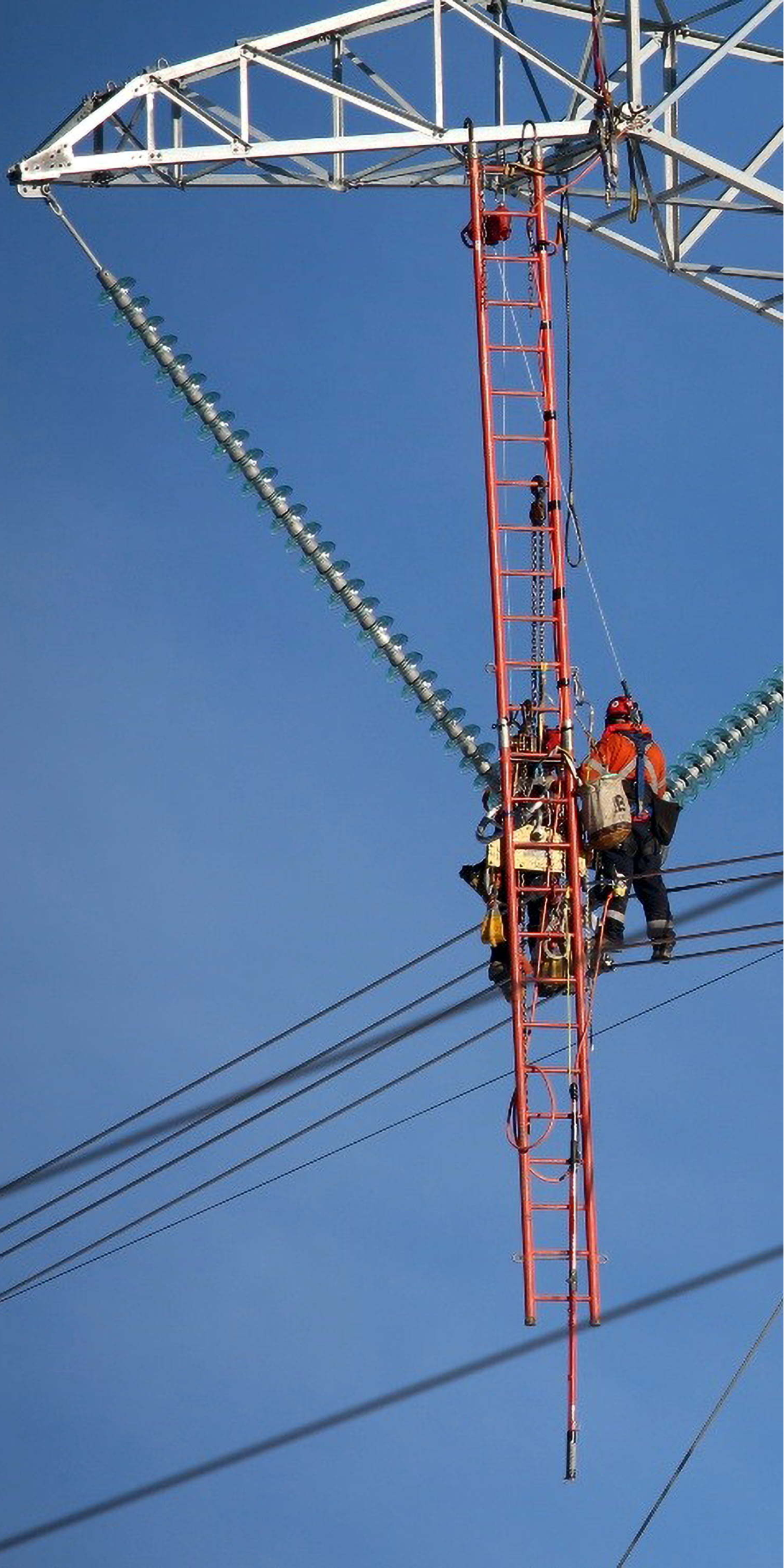 image of maintenance crew working on aircraft
