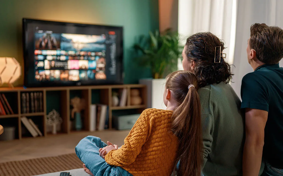 Family watching connected TV advertising