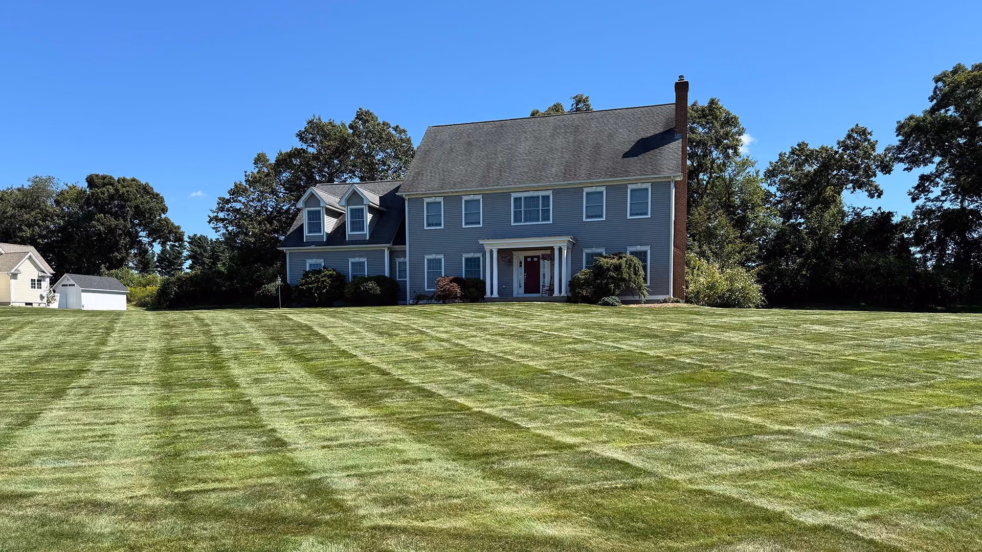 Professional lawn care services by Earth Management Solutions in Eastern Connecticut