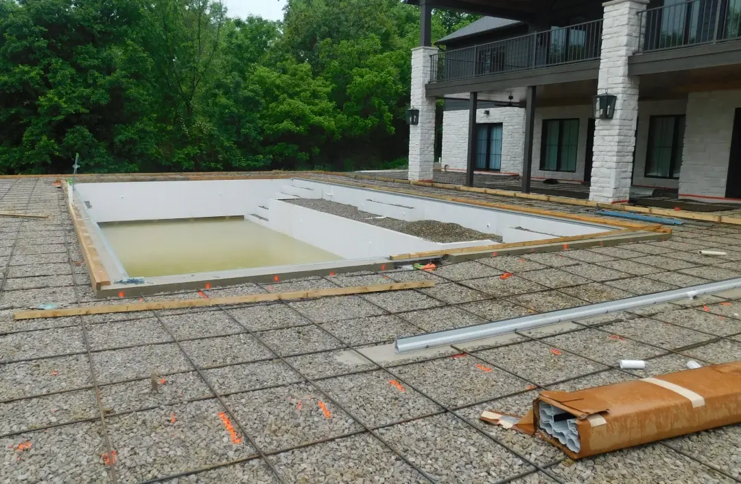 in ground pool under construction in process
