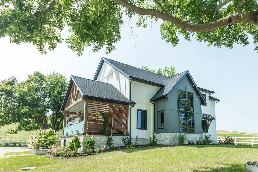 new built home covered porch on side of home