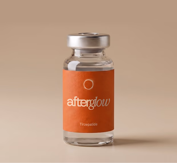Clear glass vial with a silver cap and an orange label reading 'afterglow Tirzepatide' on a beige background.