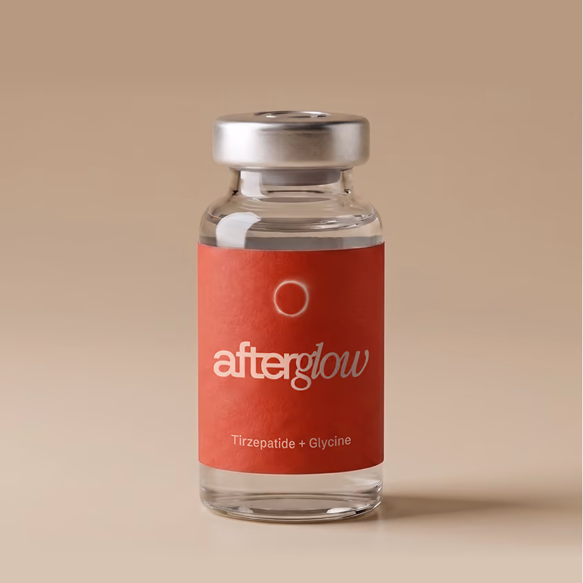 Clear glass vial with a silver cap, labeled 'afterglow' in white and gray text on a red background, containing Tirzepatide and Glycine solution.