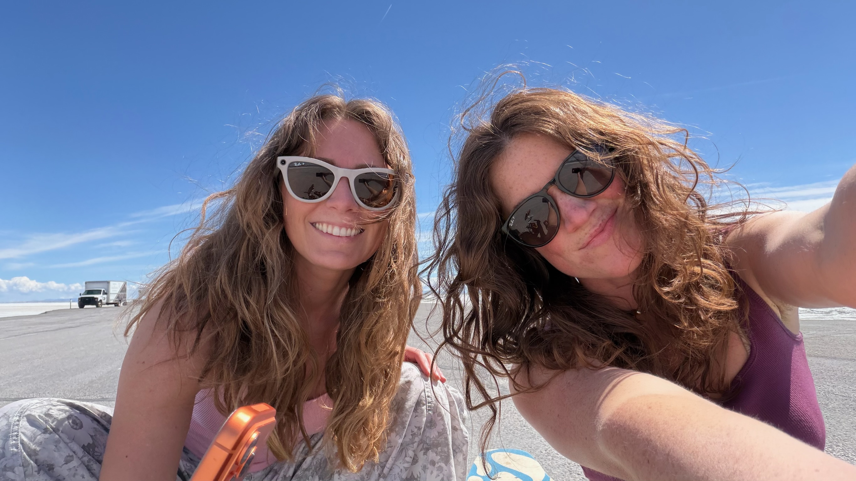 Tiffany and Sarah smiling on the salt flats