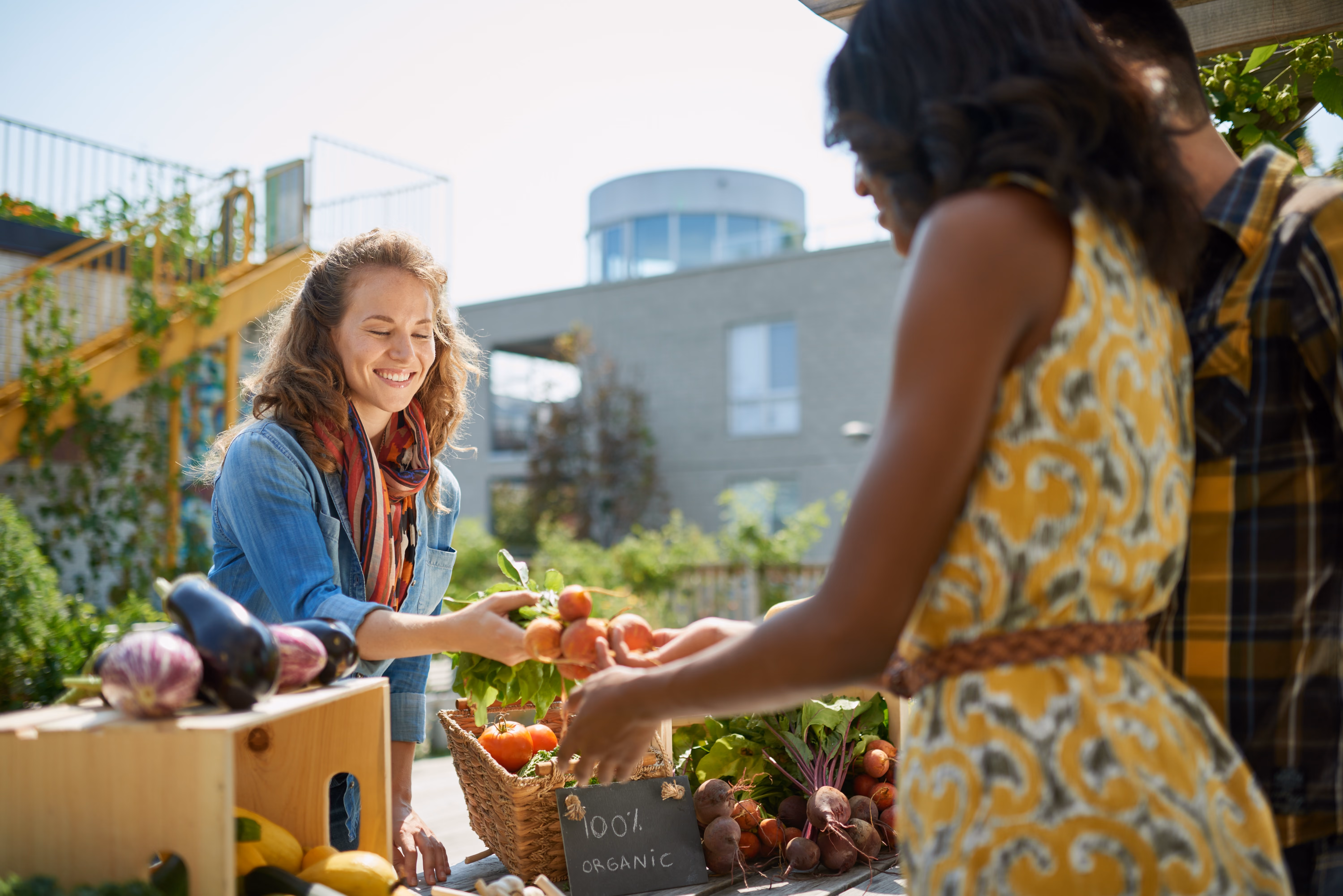 People at a farmers market stock image