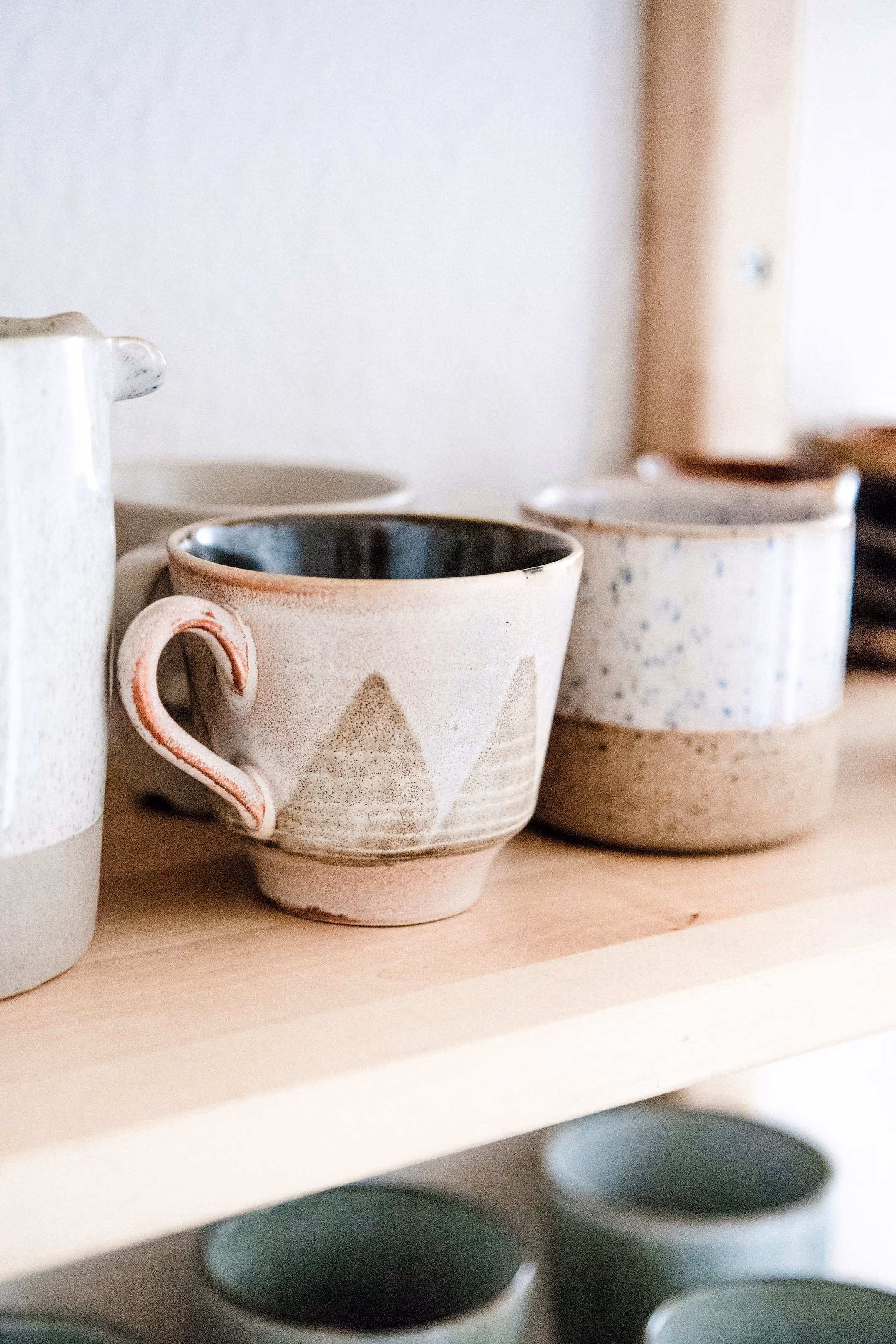 Coffee cups on a shelf stock image