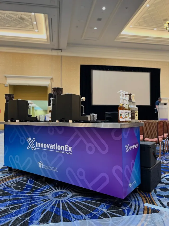 Branded coffee cart at a trade show