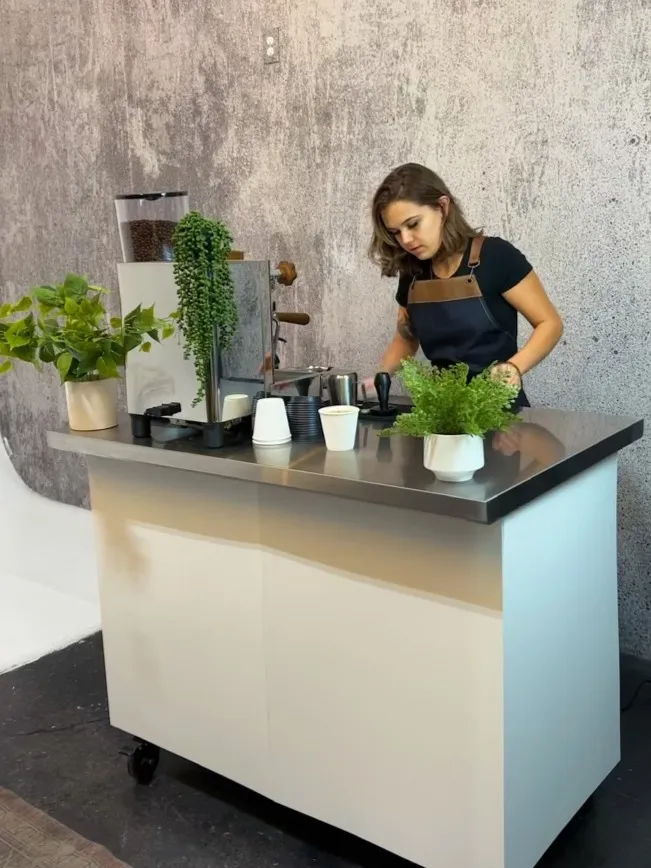 Barista serving coffee to guests in Washington DC