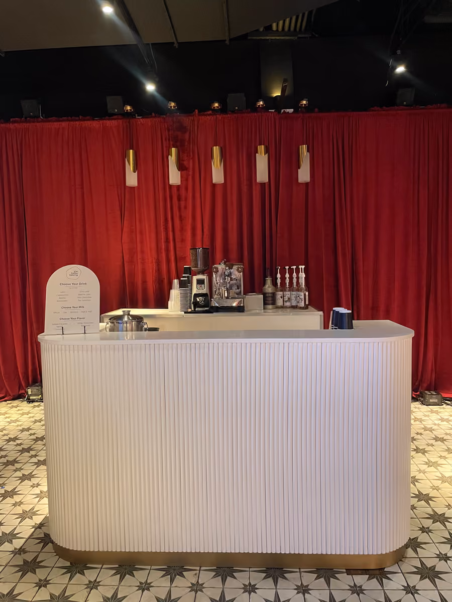 Vim Coffee Catering mobile espresso cart serving guests at a client event