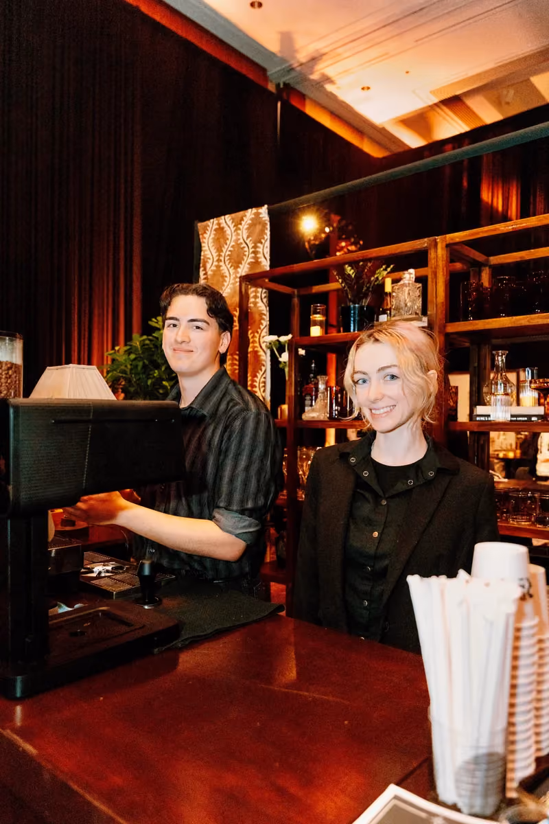 Vim Coffee Catering mobile espresso cart serving guests at a client event