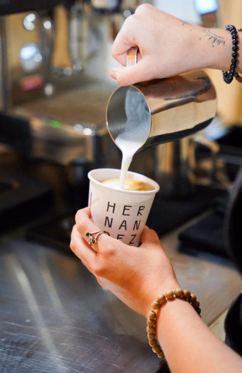 Vim Coffee Catering mobile espresso cart serving guests at a client event
