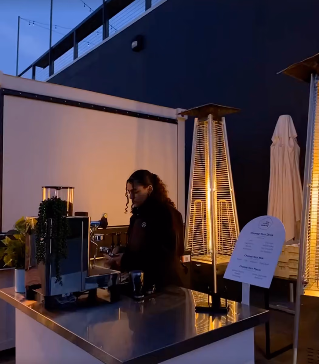Vim Coffee Catering mobile espresso cart serving guests at a client event