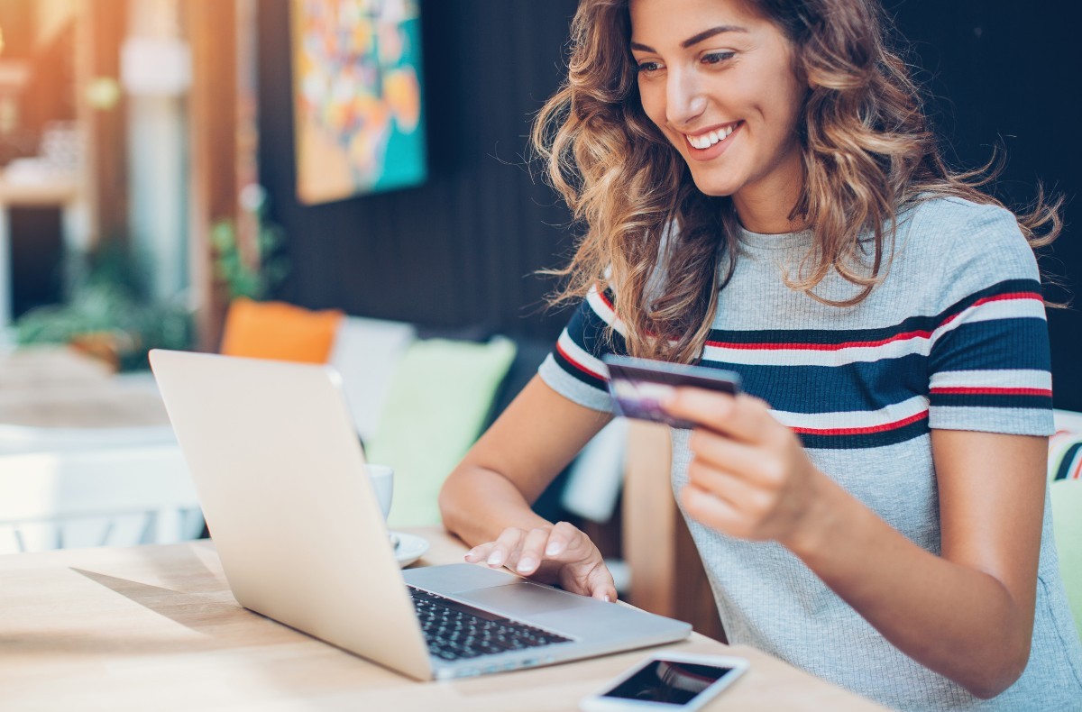 Entering a card payment on a laptop