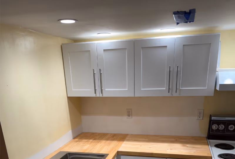 How To Do A Holiday Kitchen Renovation: Cabinet Removal, Wall Repair, and Butcher Block Countertop Installation in East Vancouver