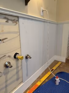 Install the Wainscoting with Adhesive and Pins